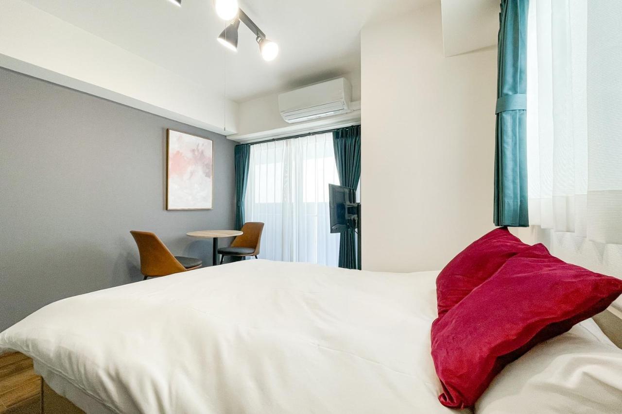 Grandia Shinsaibashi Apartment Osaka Bagian luar foto